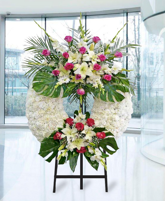 Corona funeraria de doble cabezal blanca en Gijón