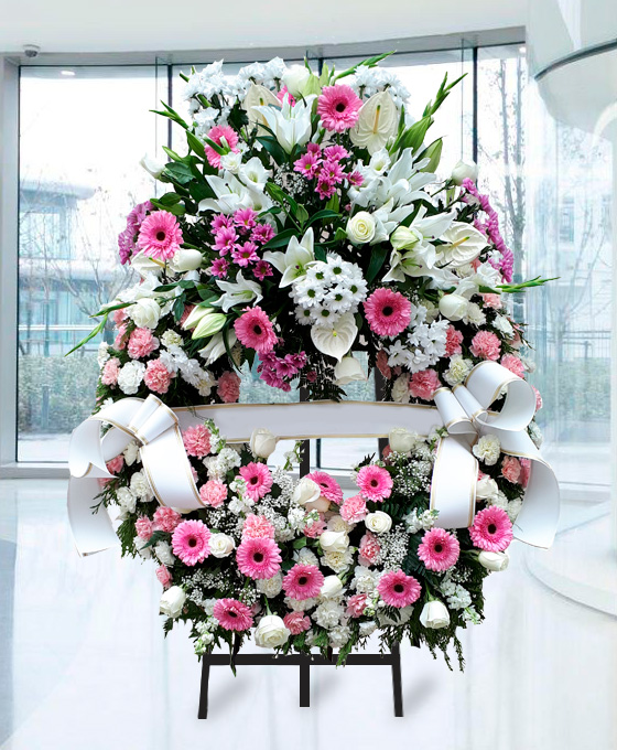 Corona Funeraria con tonos rosados para Gijón